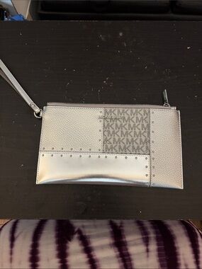 Michael Kors Metallic Silver Patchwork Logo Wristlet Clutch